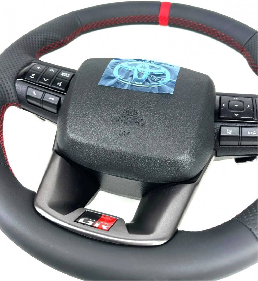 Volan din piele cu incalzire airbag si spira pentru Toyota Hilux GR